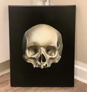 Oliemaleri af realistisk kranie på sort baggrund af Tattoo Mini