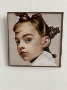 Portrait of a Young Girl with branded hair. Hyperrealistic style . Painted with airbrush in soft colors