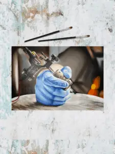 Realistisk tatoveringsmaskine -oliemaleri fra Tattoo Mini København, specialist i realisme